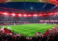 Estádio Emirates iluminado durante um jogo do Arsenal na Premier League em 2026.