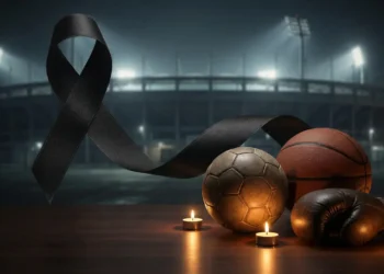 Homenagem póstuma com símbolos esportivos e fita de luto.